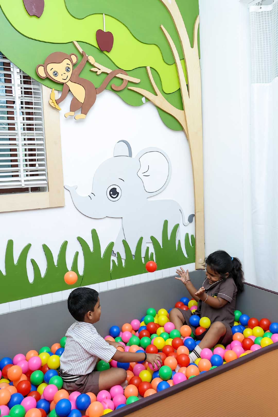 Kids playing in ball pit